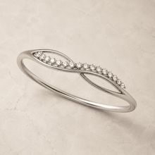 The "Forever Yours" Infinity Bangle — Silver-Tone Infinity Bangle by House of Zena, side angle