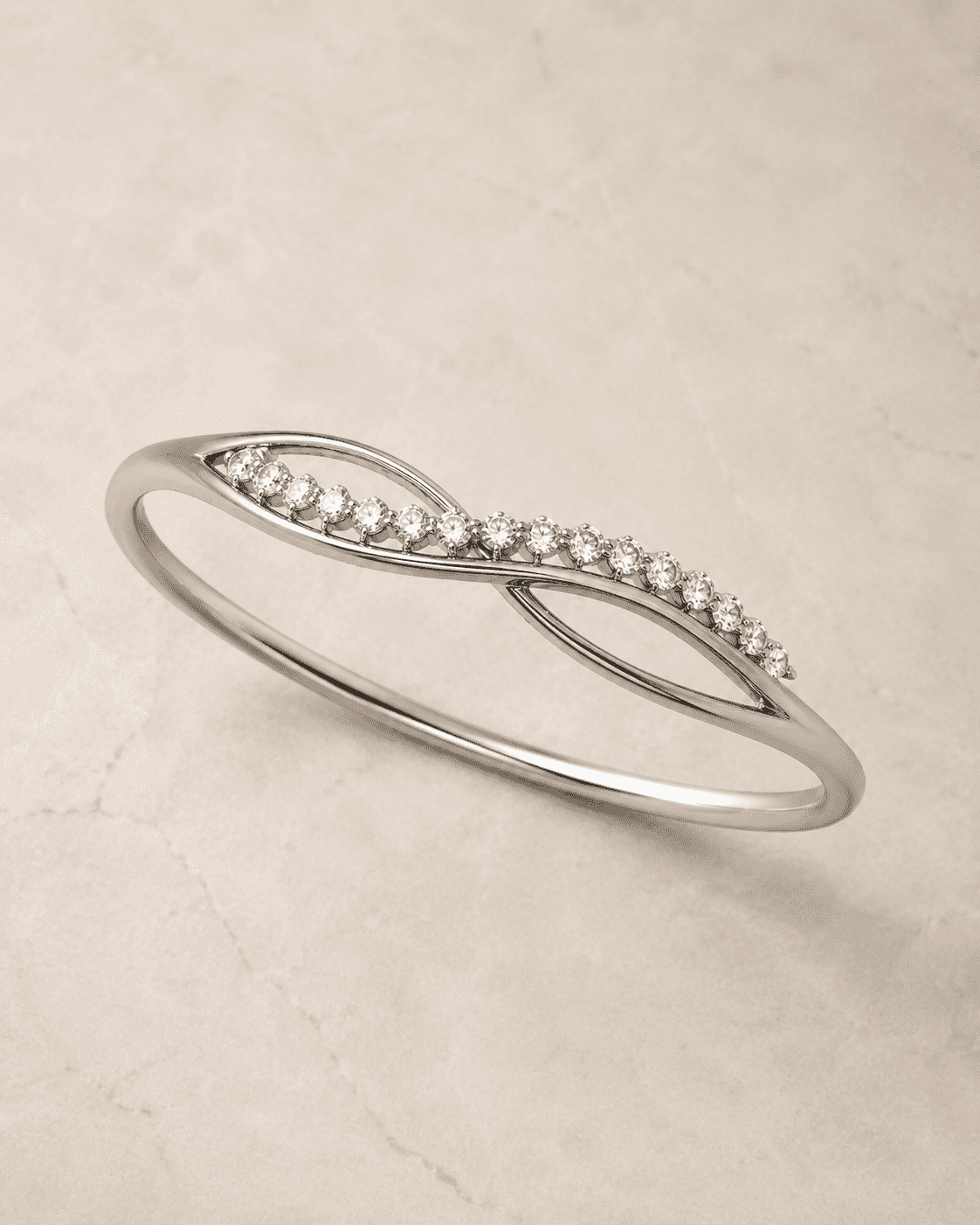 The "Forever Yours" Infinity Bangle — Silver-Tone Infinity Bangle by House of Zena, side angle
