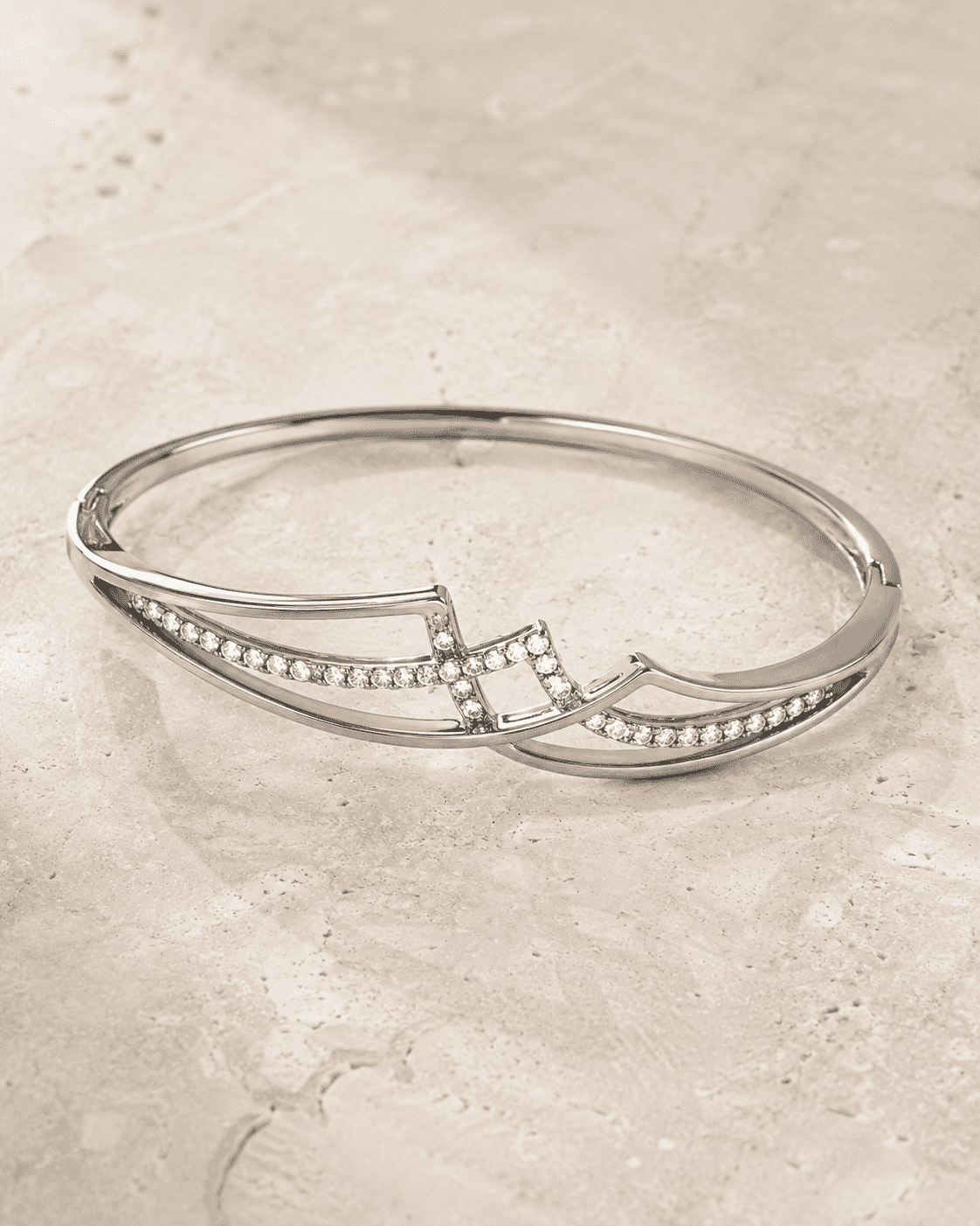 The Liquid Gold Contour Cuff — Silver-Tone Curve Bangle by House of Zena, worn on model