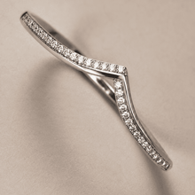 The "Kiss Me" Crisscross Bangle — Silver-Tone Twist Pavé Bangle by House of Zena, close-up detail