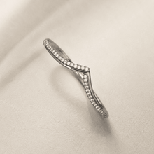 The "Kiss Me" Crisscross Bangle — Silver-Tone Twist Pavé Bangle by House of Zena, side angle