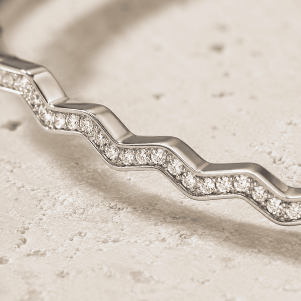 The High Tide Ripple Bangle — Gold Plated Linéa Wave Pavé Bangle by House of Zena, styled on model — Anti-Tarnish Waterproof Jewellery | House of Zena