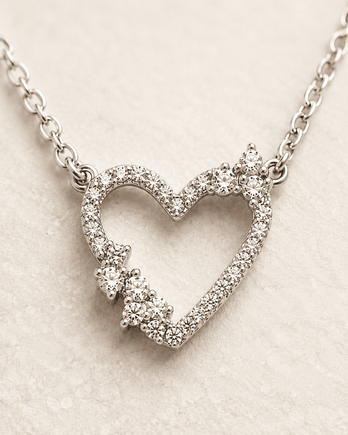 The "Wear Your Heart" Floating Pendant — Gold Plated Open Heart Necklace by House of Zena, styled on model