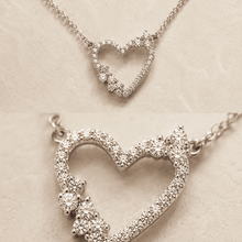The "Wear Your Heart" Floating Pendant — Gold Plated Open Heart Necklace by House of Zena, close-up detail