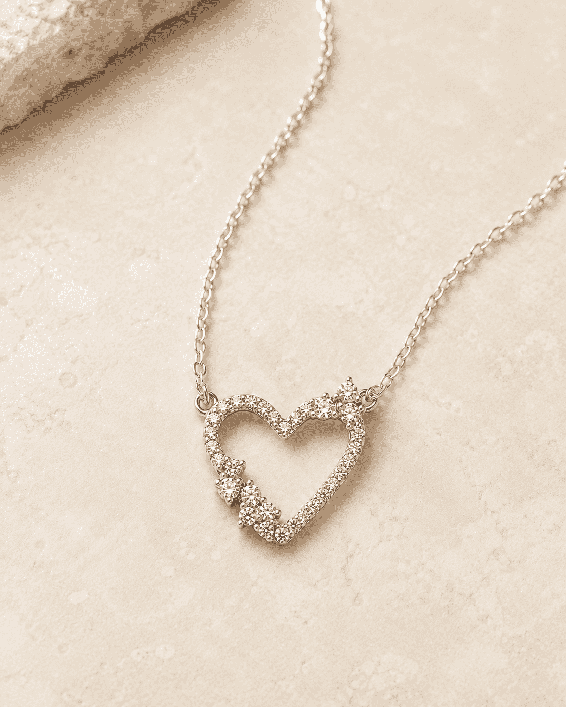 The "Wear Your Heart" Floating Pendant — Gold Plated Open Heart Necklace by House of Zena, worn on model