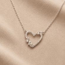 The "Wear Your Heart" Floating Pendant — Gold Plated Open Heart Necklace by House of Zena, side angle
