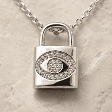 The "Mind Your Business" Padlock — Silver-Tone Lock Evil Eye Necklace by House of Zena, close-up detail