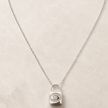 The "Mind Your Business" Padlock — Silver-Tone Lock Evil Eye Necklace by House of Zena, side angle
