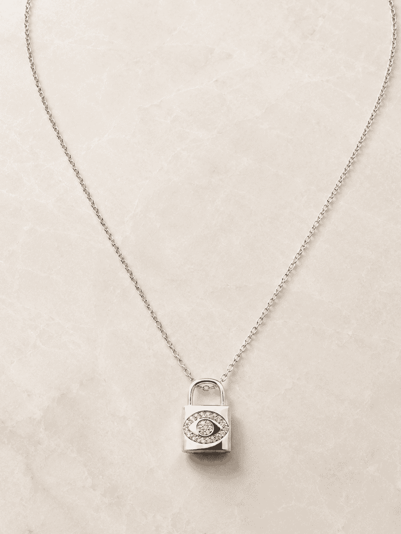 The "Mind Your Business" Padlock — Silver-Tone Lock Evil Eye Necklace by House of Zena, side angle