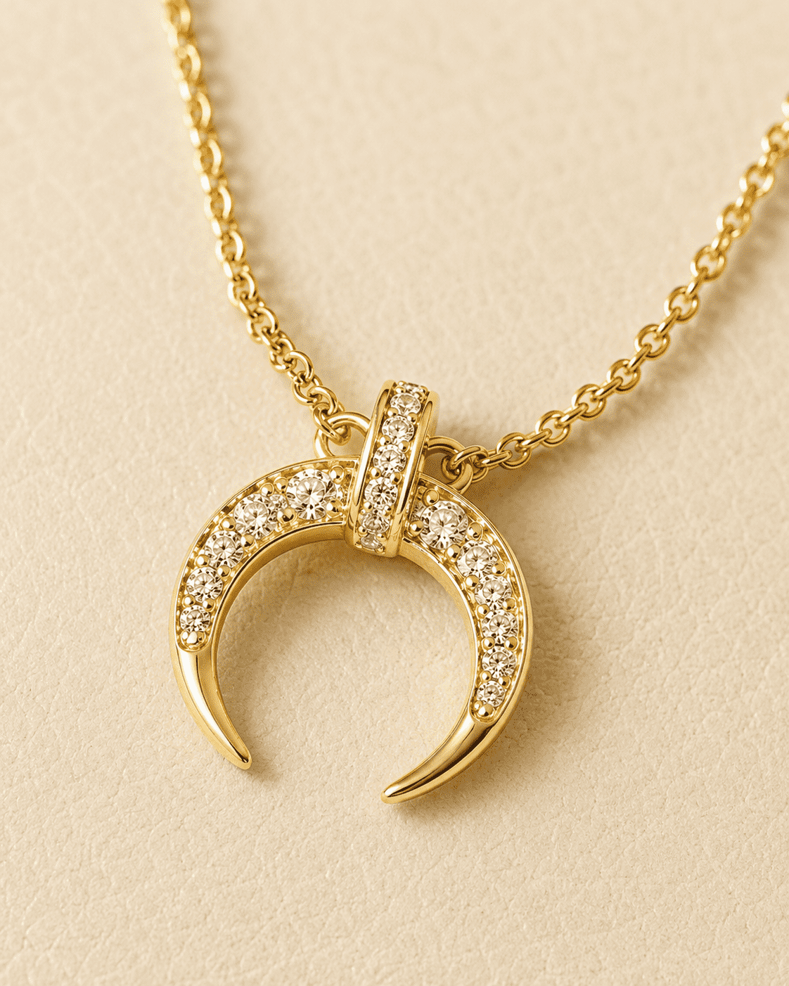 The Italian Croissant Horn Pendant — Gold Plated Crescent Necklace by House of Zena, styled on model