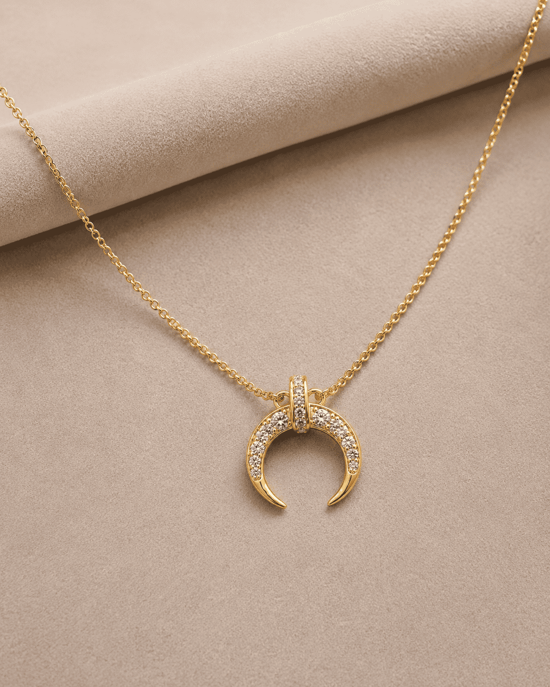The Italian Croissant Horn Pendant — Gold Plated Crescent Necklace by House of Zena, worn on model