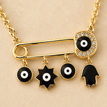 The "Bad Vibes Deflector" Medallion — Gold Plated Nazar Charm Necklace by House of Zena, close-up detail