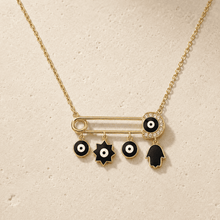 The "Bad Vibes Deflector" Medallion — Gold Plated Nazar Charm Necklace by House of Zena, worn on model