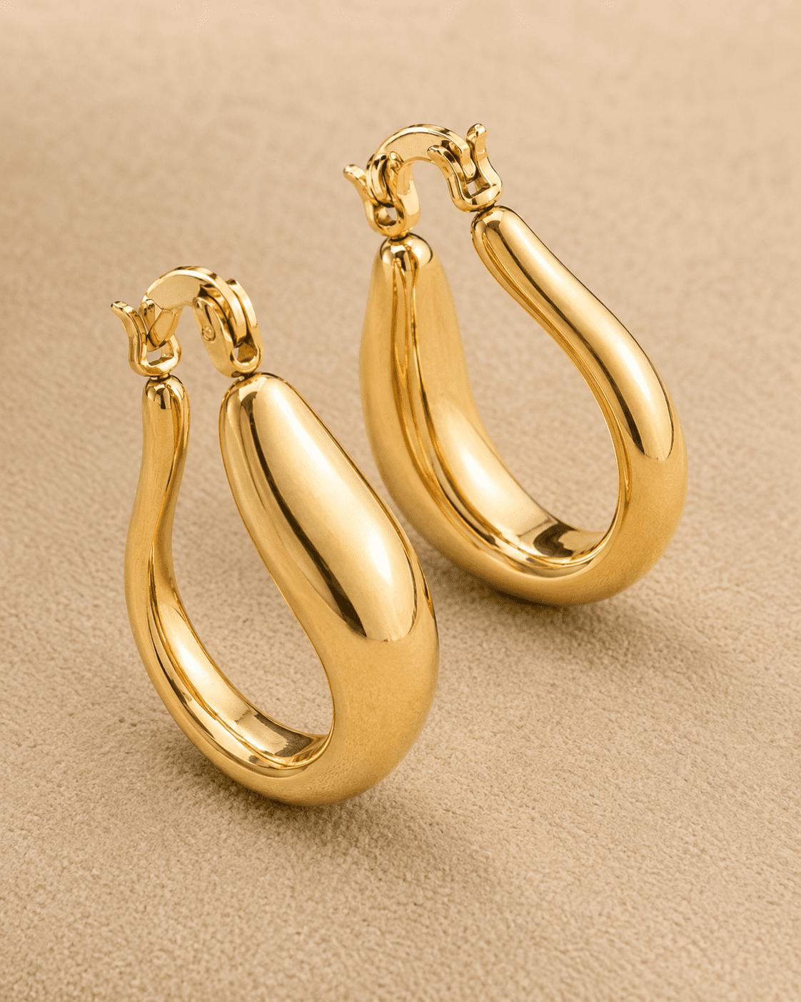 The Molten Mango Drops — Gold Plated Sculpt Hoop Earrings by House of Zena, styled on model