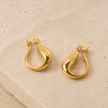 The Molten Mango Drops — Gold Plated Sculpt Hoop Earrings by House of Zena, worn on model