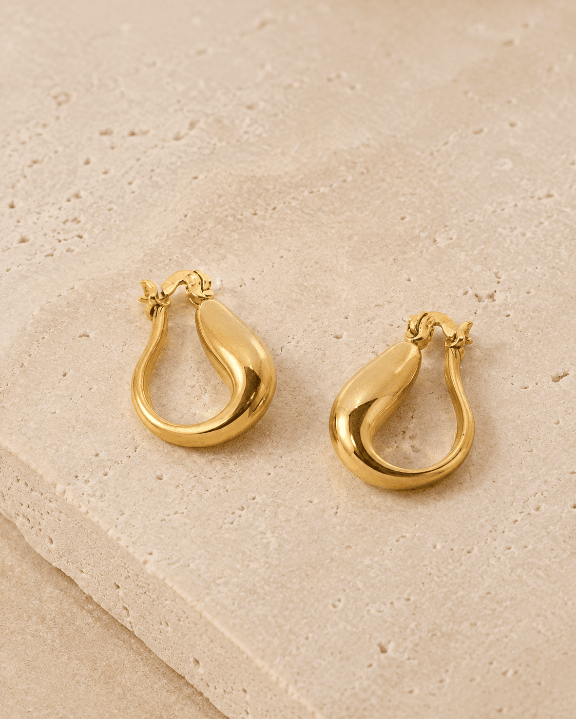 The Molten Mango Drops — Gold Plated Sculpt Hoop Earrings by House of Zena, worn on model