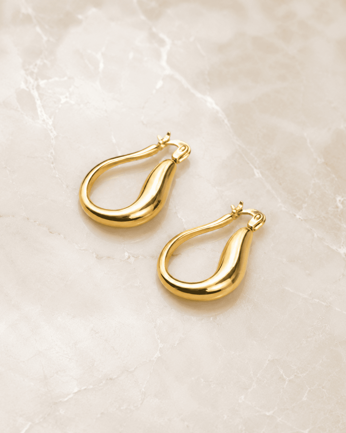 The Molten Mango Drops — Gold Plated Sculpt Hoop Earrings by House of Zena, side angle