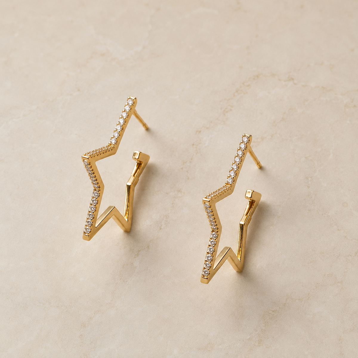 The Lucky Star Outline Hoops — Gold Plated Star Outline Hoop Earrings by House of Zena, close-up detail
