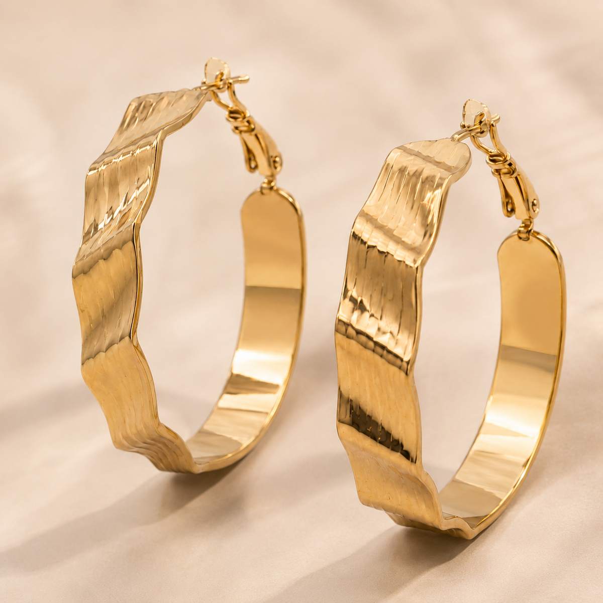 The Riviera Wave Sculpted Hoops — Gold Plated Wave Hoop Earrings by House of Zena, close-up detail