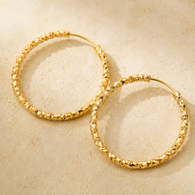 The Churro Ribbed Hoops — Gold Plated Textured Hoop Earrings by House of Zena, styled on model