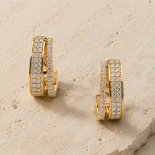 The Double Espresso Huggies — Gold Plated Double Row Huggie Earrings by House of Zena, worn on model