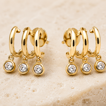 The Three Wishes Charm Hoops — Gold Plated Triple Charm Hoop Earrings by House of Zena, side angle