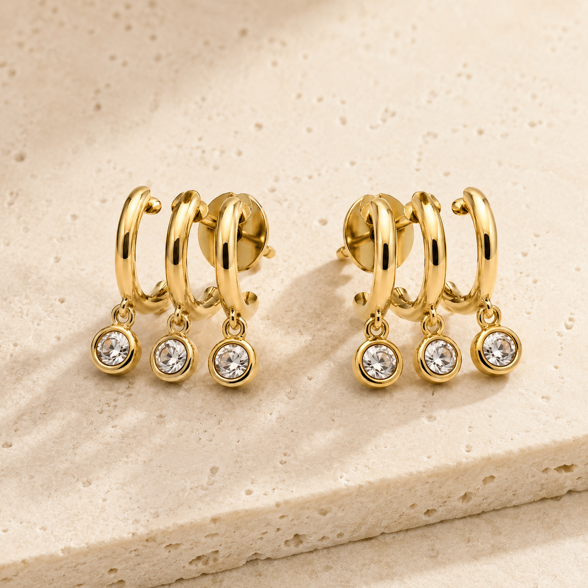 The Three Wishes Charm Hoops — Gold Plated Triple Charm Hoop Earrings by House of Zena, close-up detail