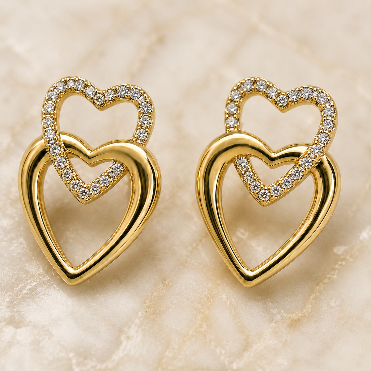 The First Crush Twin Hearts — Gold Plated Twin Heart Earrings by House of Zena, side angle