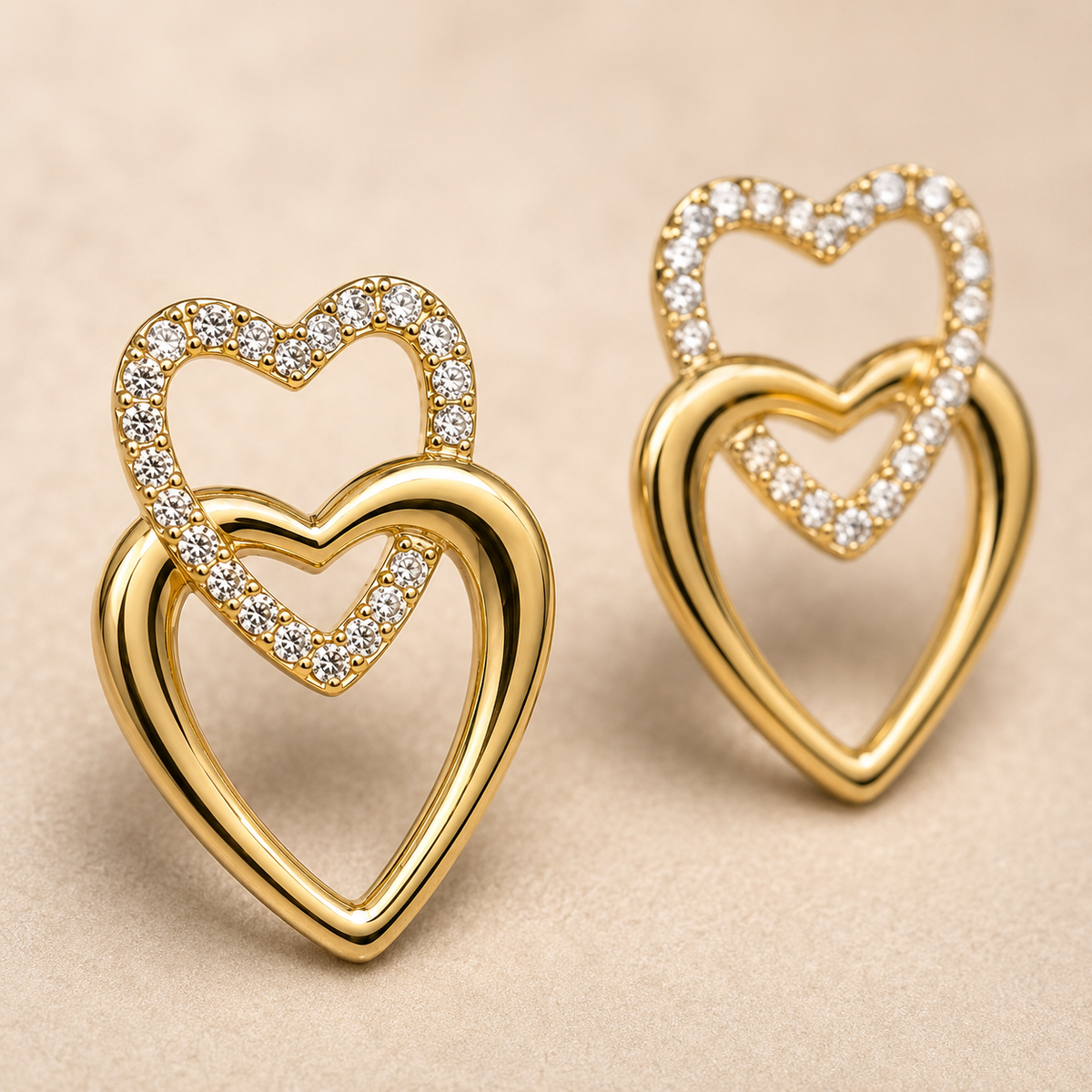 The First Crush Twin Hearts — Gold Plated Twin Heart Earrings by House of Zena, styled on model