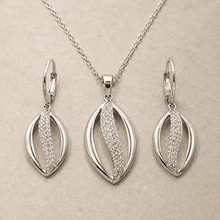 The Melted Honeycomb Set — Gold Plated Wave Pendant Set by House of Zena, styled on model