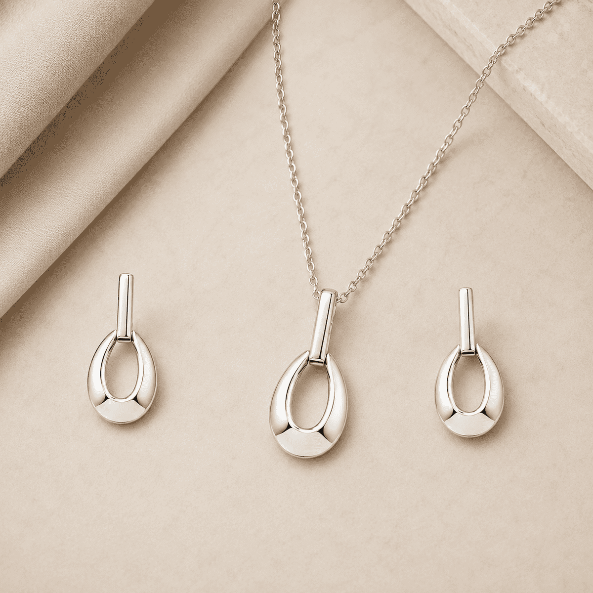 The Happy Tears Solitaire Set — Gold Plated Évara Drop Pendant Set by House of Zena, side angle