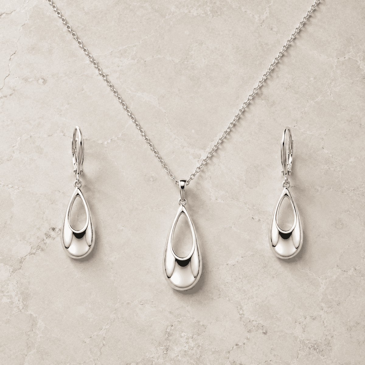 The Waterfall Martini Set — Gold Plated Seréna Drop Pendant Set by House of Zena, worn on model