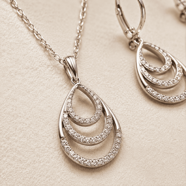The Champagne Tower Cascade Set — Gold Plated Avelisse Cascade Pendant Set by House of Zena, styled on model — Anti-Tarnish Waterproof Jewellery | House of Zena