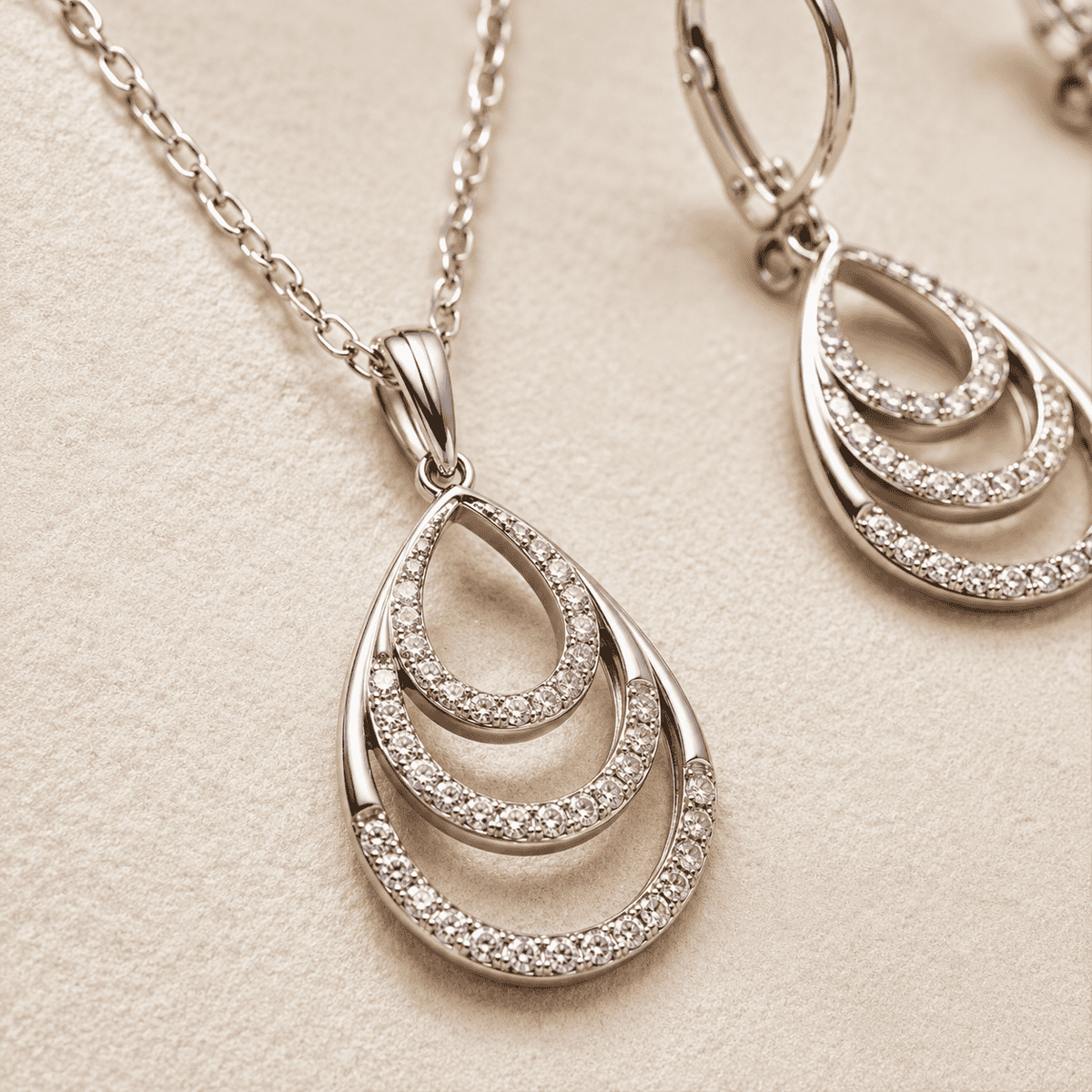 The Champagne Tower Cascade Set — Gold Plated Avelisse Cascade Pendant Set by House of Zena, styled on model