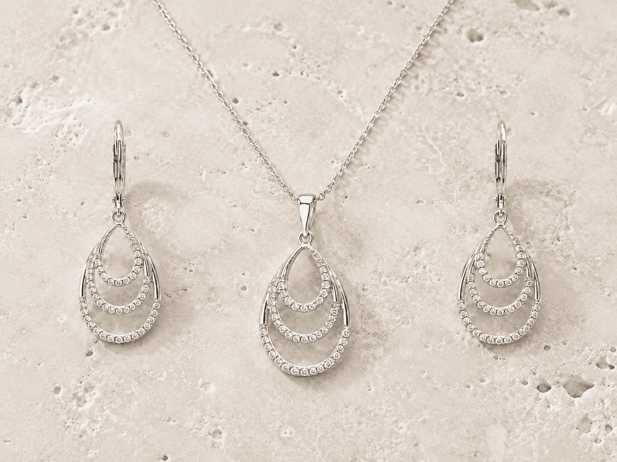 The Champagne Tower Cascade Set — Gold Plated Avelisse Cascade Pendant Set by House of Zena, worn on model