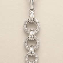 The "You & Me" Interlock Set — Silver-Tone Link Pendant Set by House of Zena, close-up detail