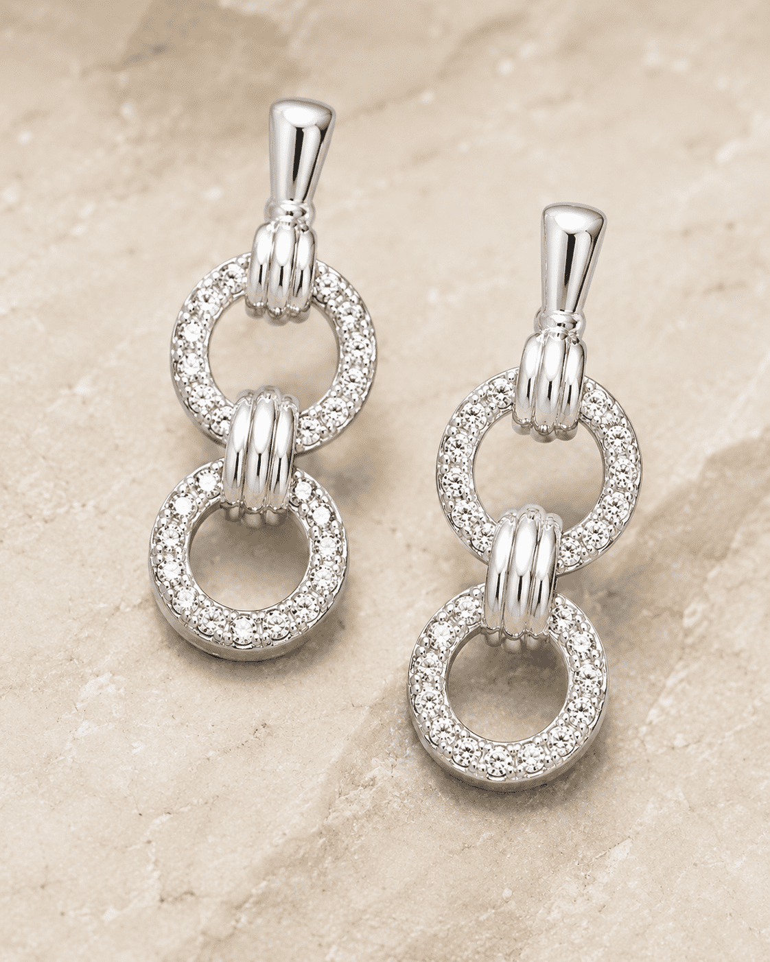 The "You & Me" Interlock Set — Silver-Tone Link Pendant Set by House of Zena, styled on model
