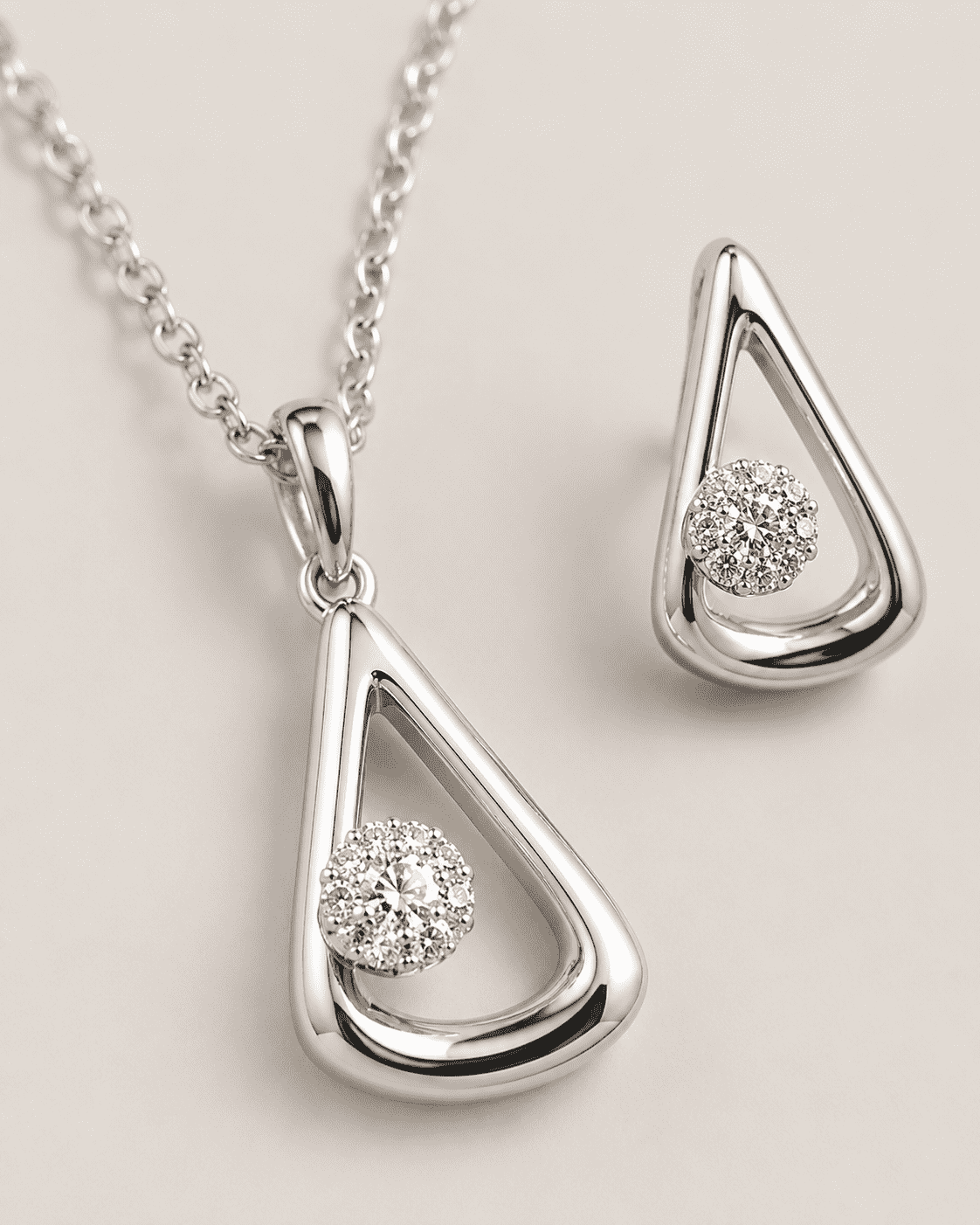The "I Woke Up Like This" Set — Silver-Tone Drop Pendant Set by House of Zena, styled on model