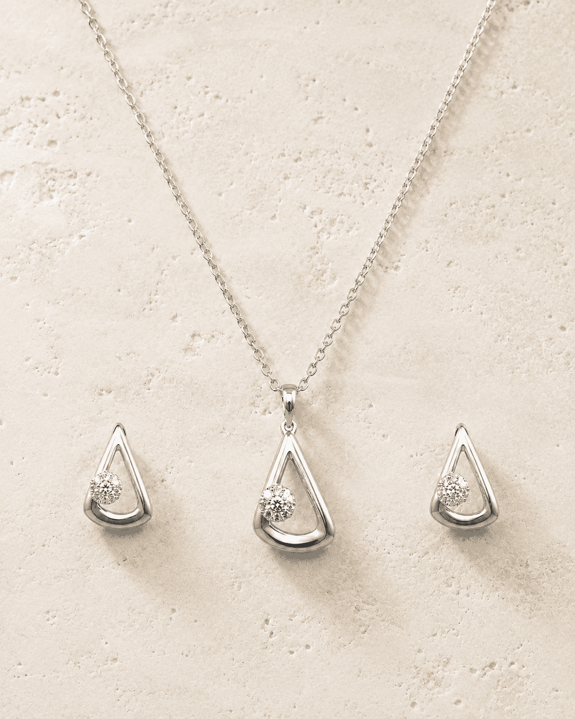 The "I Woke Up Like This" Set — Silver-Tone Drop Pendant Set by House of Zena, worn on model