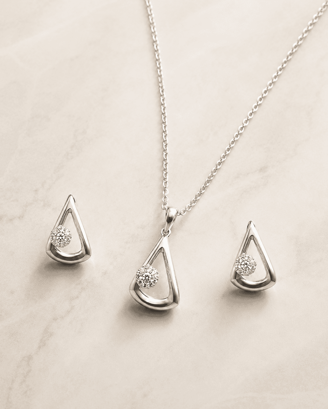 The "I Woke Up Like This" Set — Silver-Tone Drop Pendant Set by House of Zena, side angle