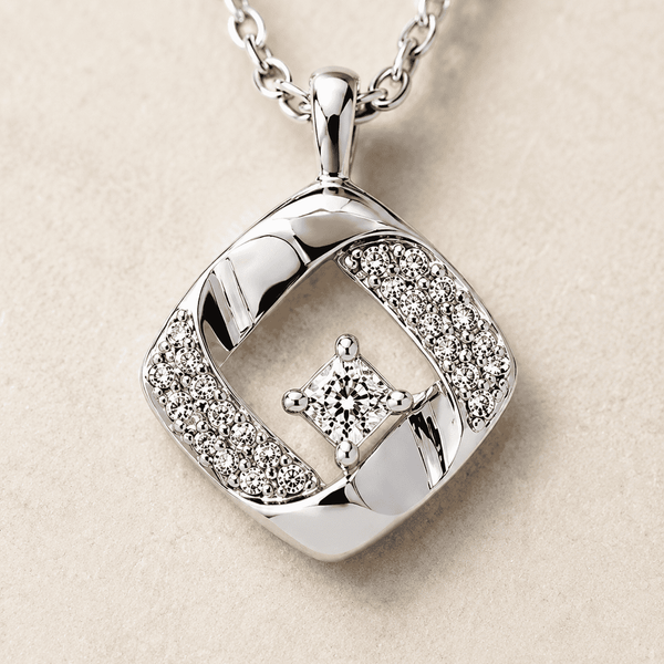 The Sugar Cube Solitaire Set — Gold Plated Square Pendant Set by House of Zena, styled on model — Anti-Tarnish Waterproof Jewellery | House of Zena