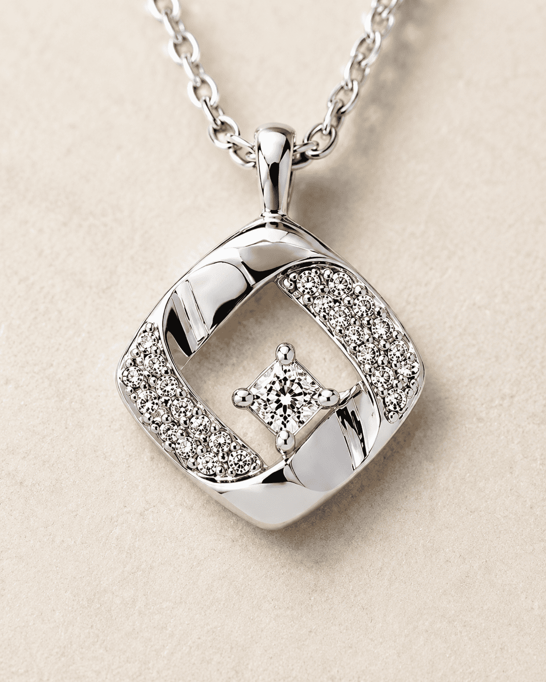 The Sugar Cube Solitaire Set — Gold Plated Square Pendant Set by House of Zena, styled on model