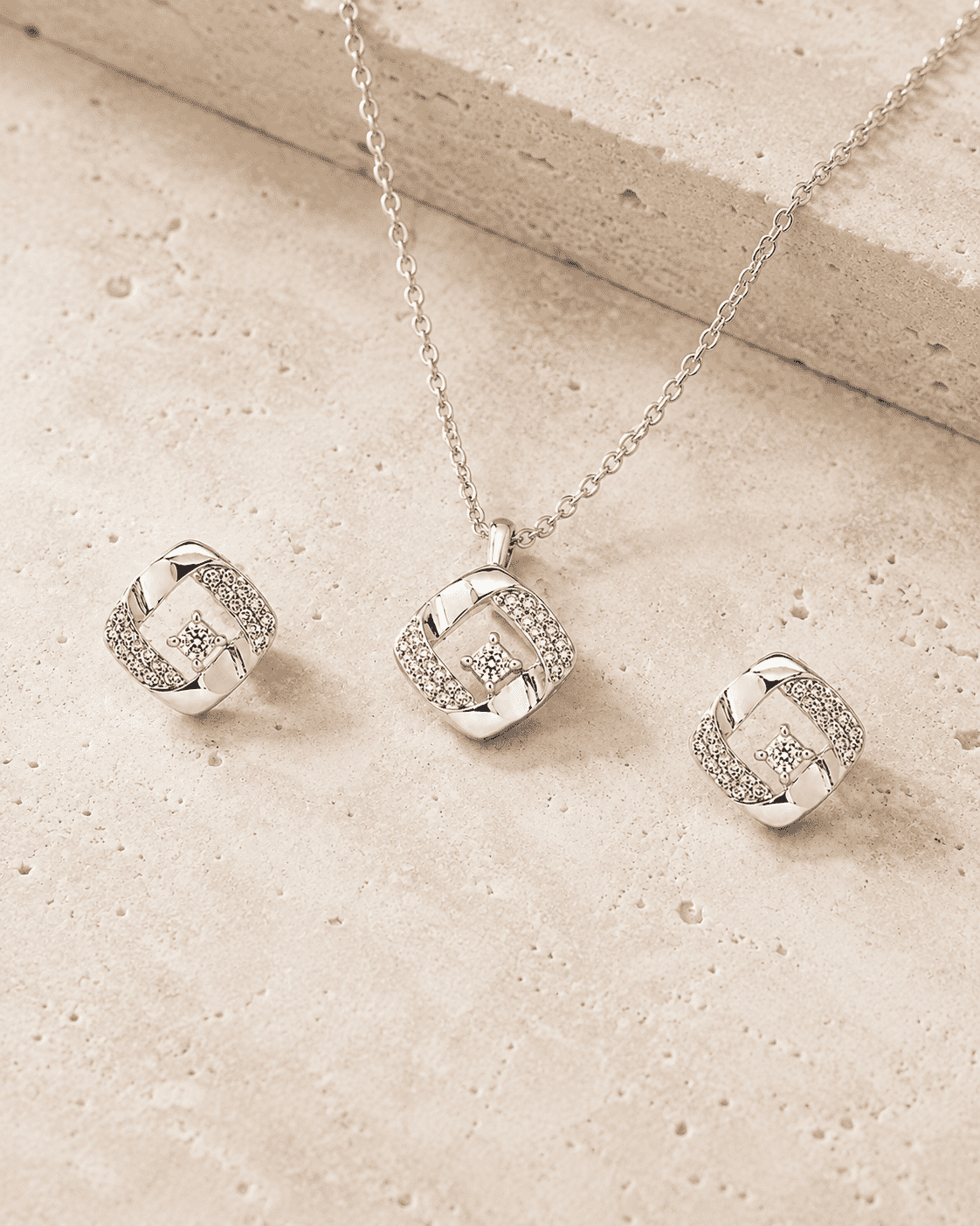 The Sugar Cube Solitaire Set — Gold Plated Square Pendant Set by House of Zena, worn on model