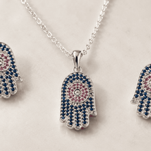 The "Good Karma Only" Hamsa Set — Silver-Tone Hamsa Pendant Set by House of Zena, close-up detail