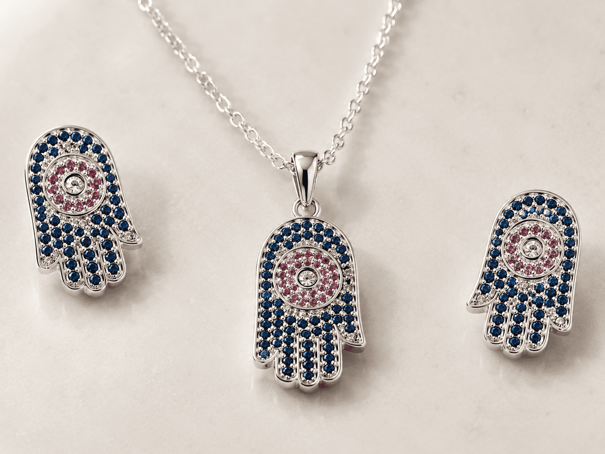 The "Good Karma Only" Hamsa Set — Silver-Tone Hamsa Pendant Set by House of Zena, close-up detail
