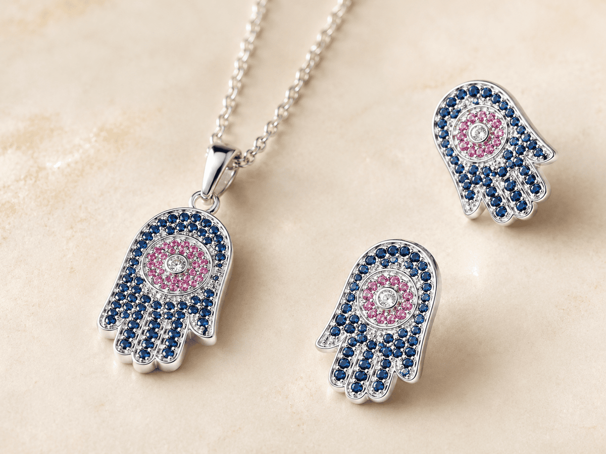 The "Good Karma Only" Hamsa Set — Silver-Tone Hamsa Pendant Set by House of Zena, styled on model