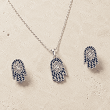 The "Good Karma Only" Hamsa Set — Silver-Tone Hamsa Pendant Set by House of Zena, worn on model
