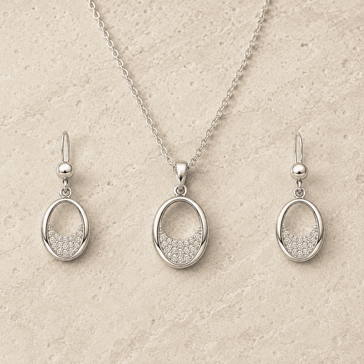 The Almond Truffle Solitaire Set — Silver-Tone Oval Pendant Set by House of Zena, side angle