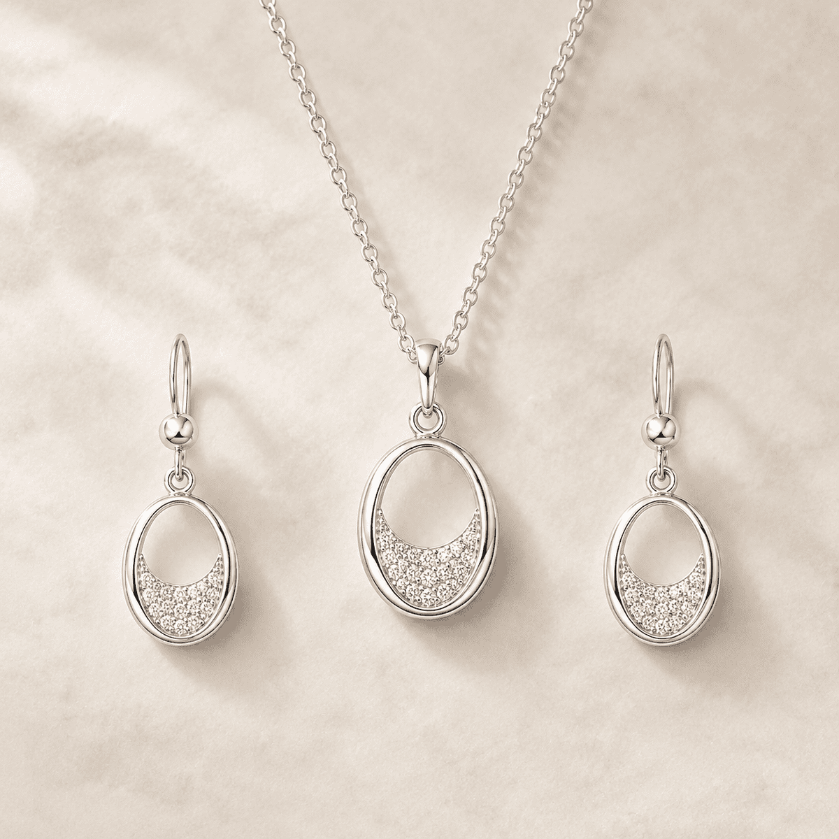The Almond Truffle Solitaire Set — Silver-Tone Oval Pendant Set by House of Zena, close-up detail