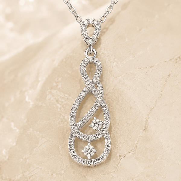 The "Pinky Promise" Infinity Set — Silver-Tone Infinity Grace Pendant Set by House of Zena, styled on model — Anti-Tarnish Waterproof Jewellery | House of Zena